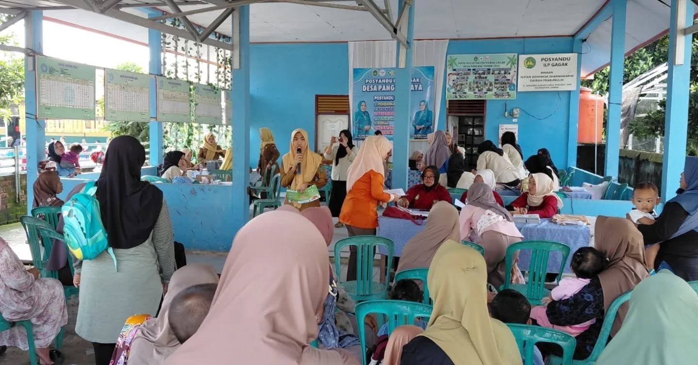 Pemberian obat pencegahan massal ( POPM ) kecacingan di posyandu ILP Kenari Dan Gagak